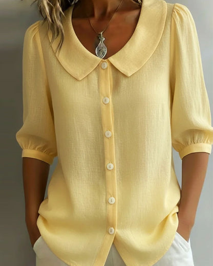 Women's blue Peter Pan collar blouse with 3/4 sleeves