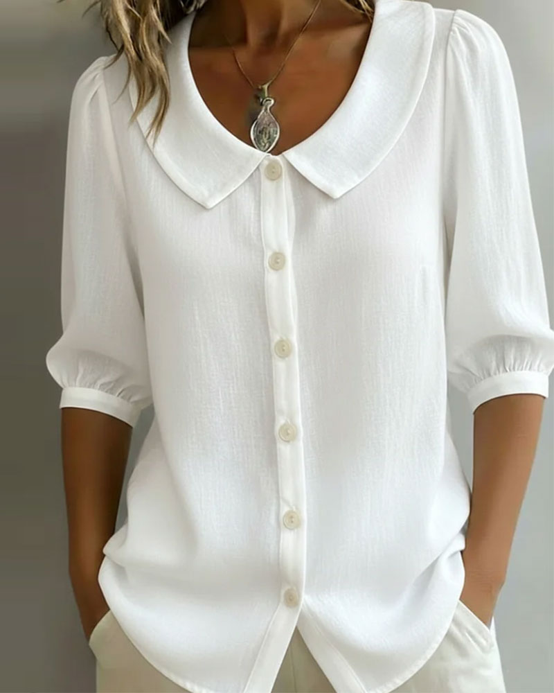 Women's blue Peter Pan collar blouse with 3/4 sleeves