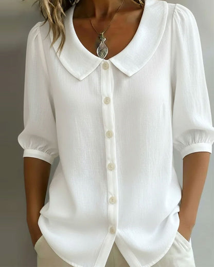 Women's blue Peter Pan collar blouse with 3/4 sleeves