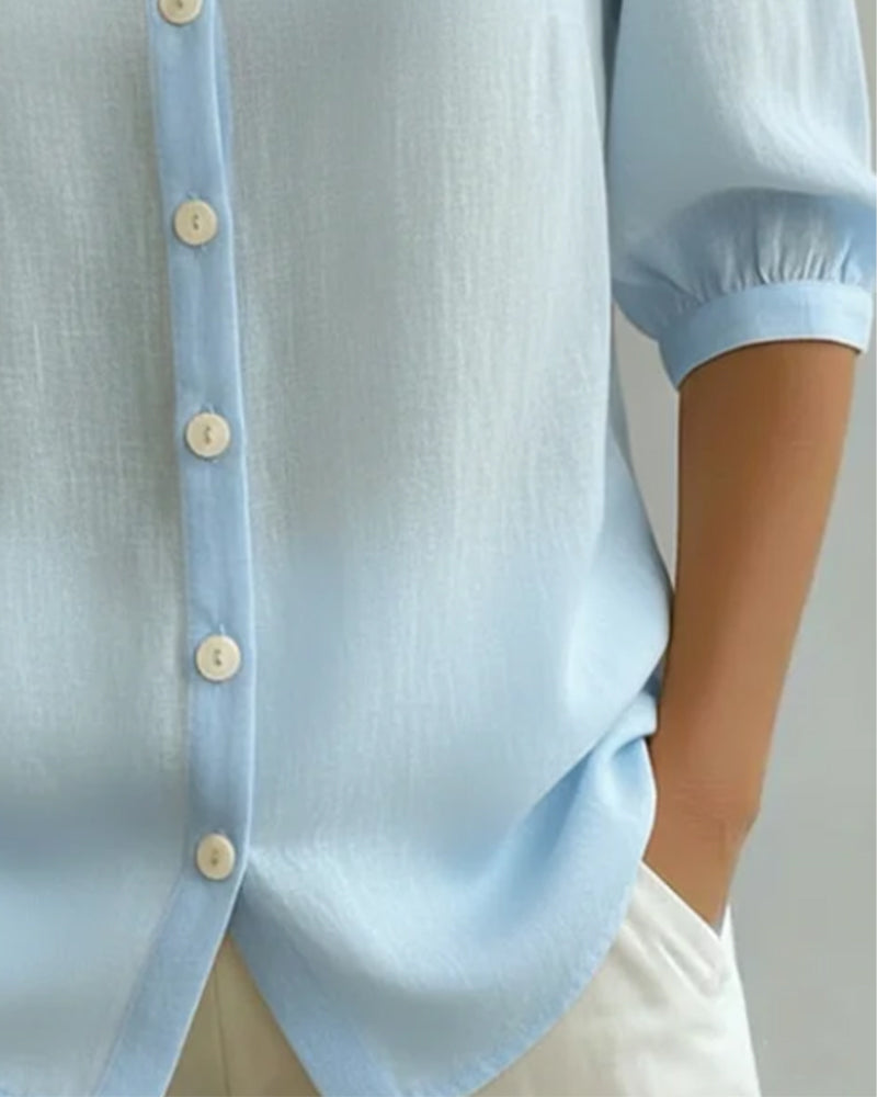 Women's blue Peter Pan collar blouse with 3/4 sleeves