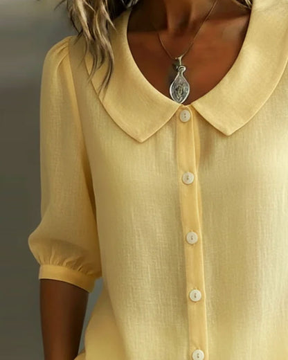 Women's blue Peter Pan collar blouse with 3/4 sleeves