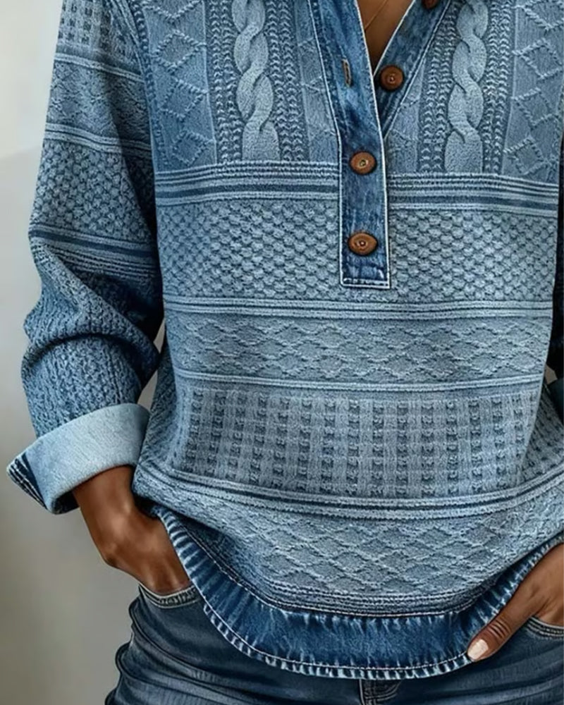 Women's cable knit button-up sweater in blue