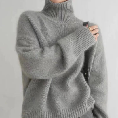 Women's cashmere turtleneck sweater with ribbed cuffs