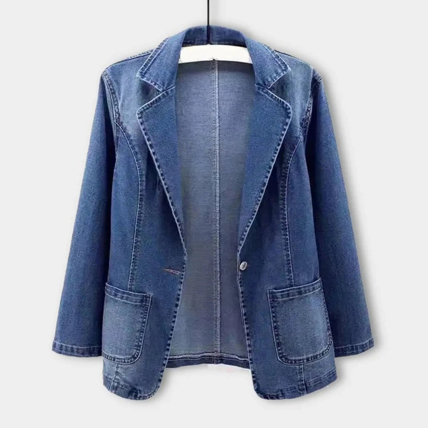 Women's blue tailored denim jacket with notched lapel
