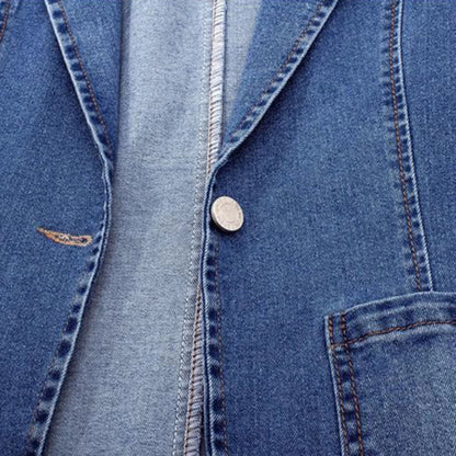 Women's blue tailored denim jacket with notched lapel