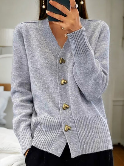 Women's pink V-neck cardigan with heart-shaped buttons