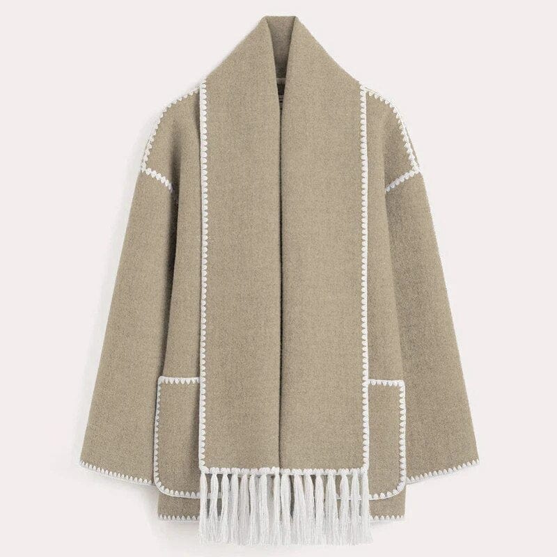 Women's beige open front cardigan with fringe trim shawl collar
