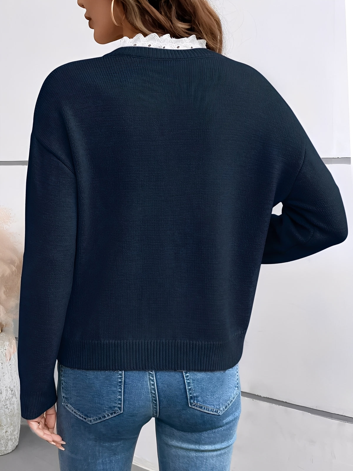 Women's blue ruffle V-neck knit sweater with long sleeves