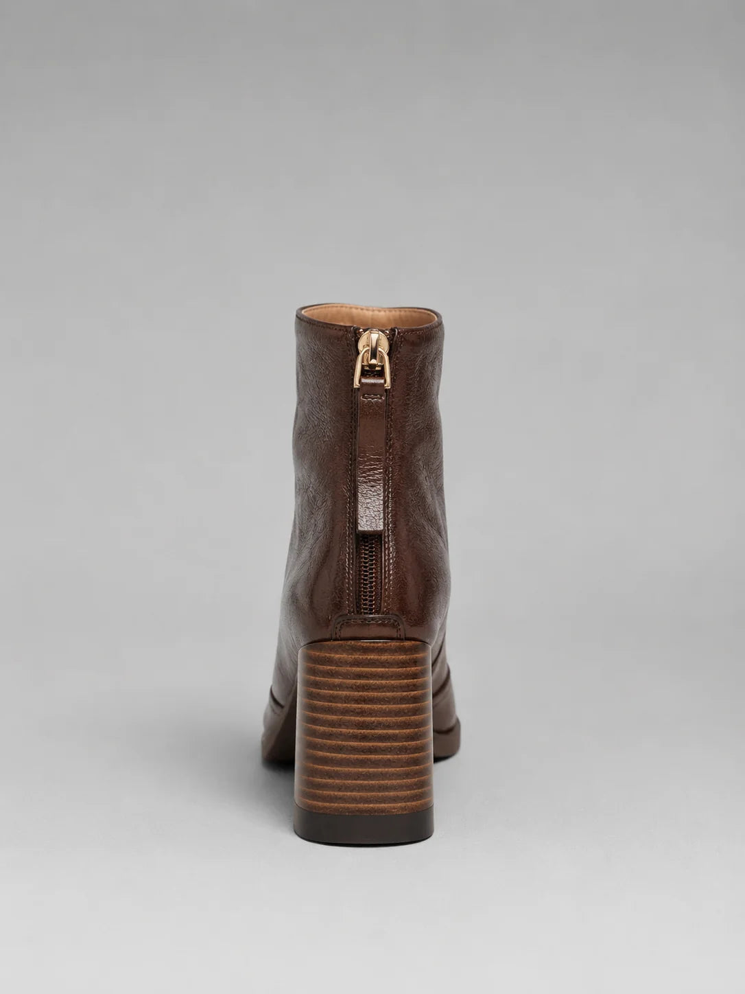 Women's black ankle boots, sleek silhouette detail