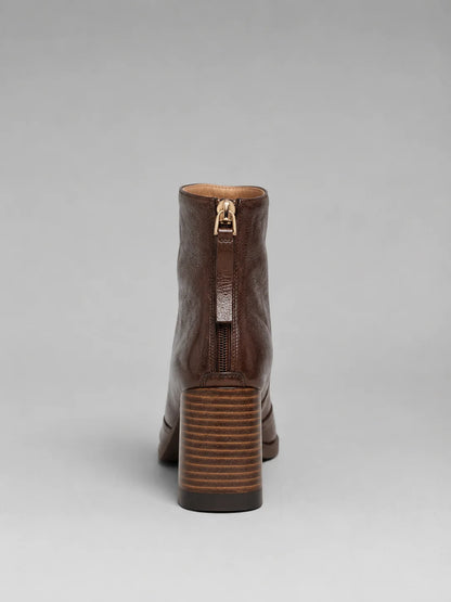 Women's black ankle boots, sleek silhouette detail