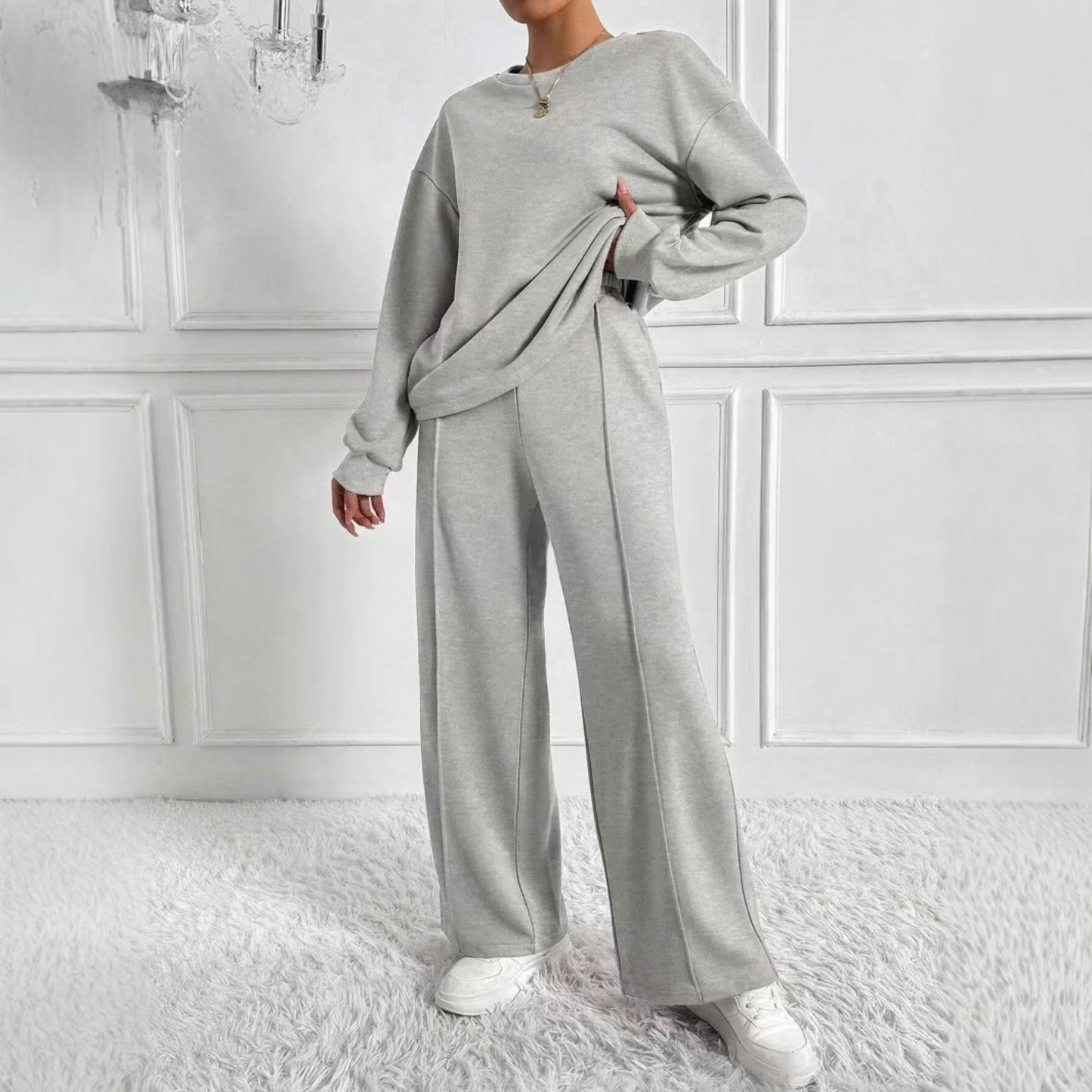 Women's light gray sweatshirt and high-waist pants matching set