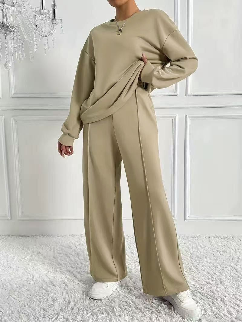 Women's light gray sweatshirt and high-waist pants matching set
