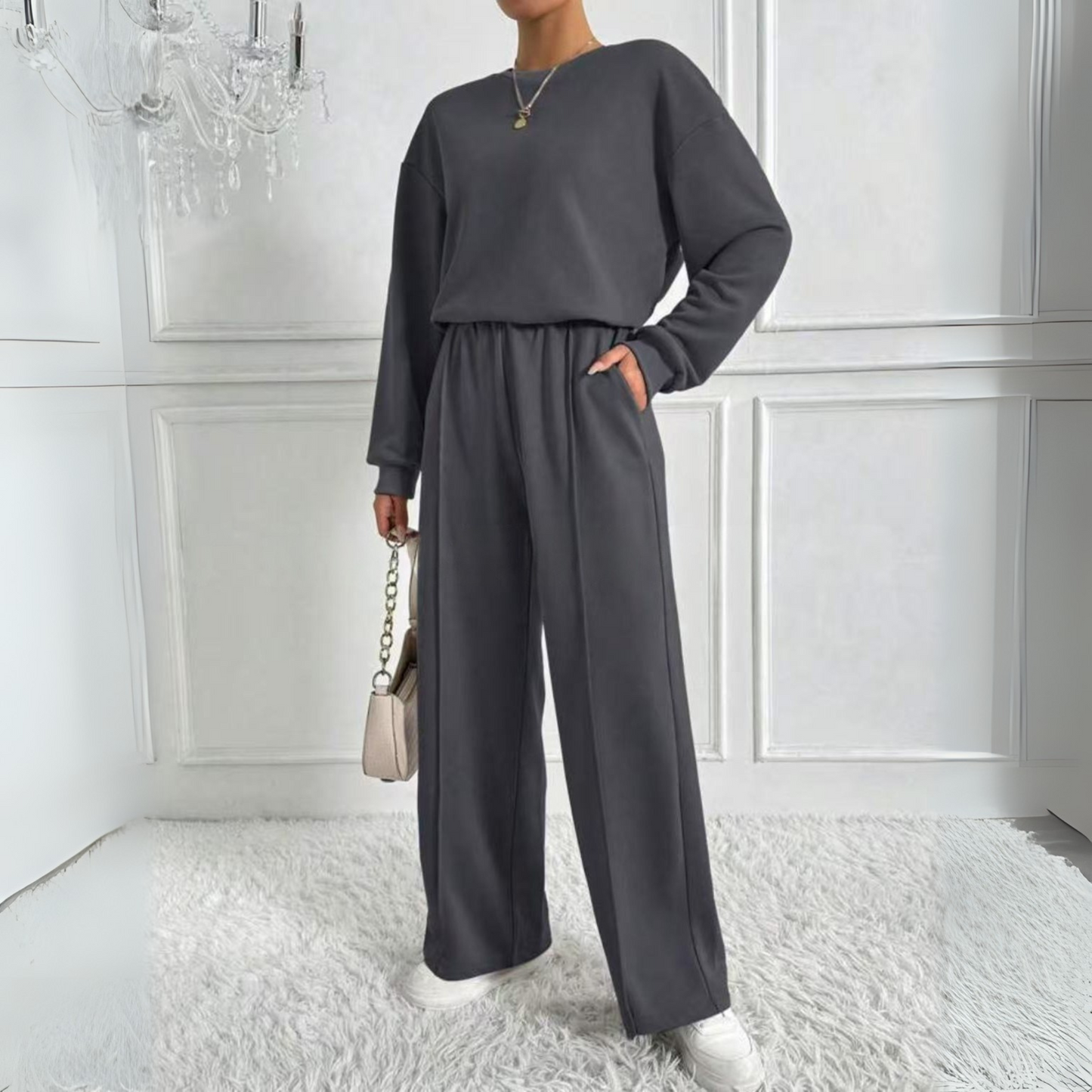 Women's light gray sweatshirt and high-waist pants matching set