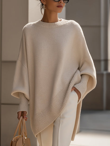 Women's beige oversized poncho sweater with batwing sleeves