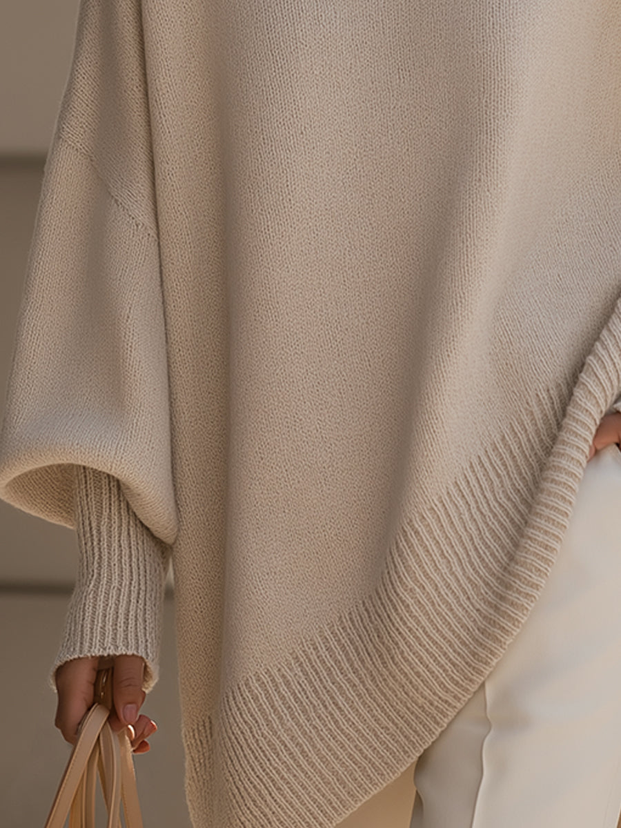 Women's beige oversized poncho sweater with batwing sleeves