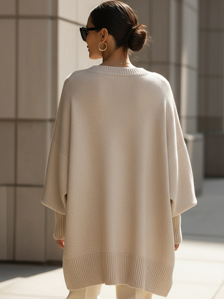 Women's beige oversized poncho sweater with batwing sleeves