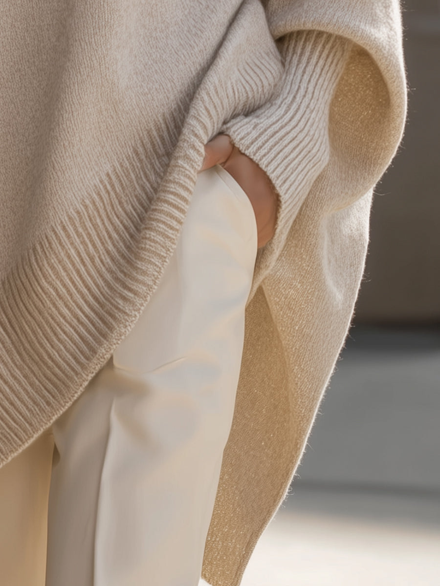 Women's beige oversized poncho sweater with batwing sleeves
