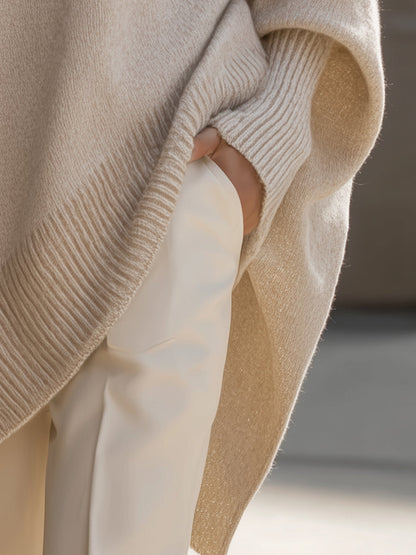 Women's beige oversized poncho sweater with batwing sleeves