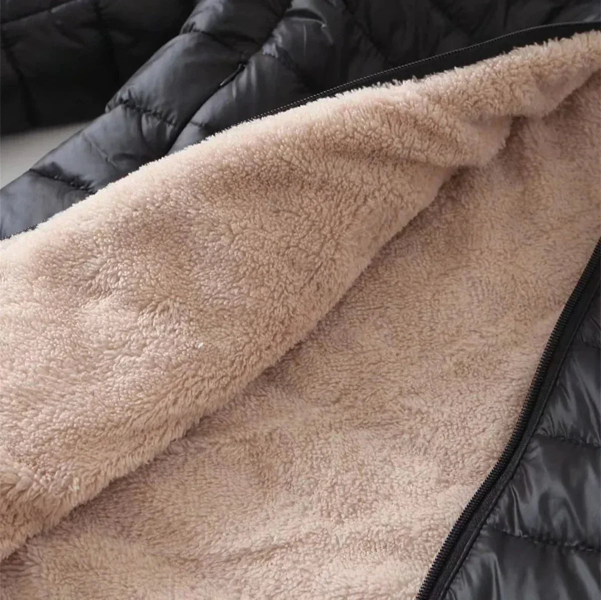 Women's long hooded puffer jacket with sherpa lining