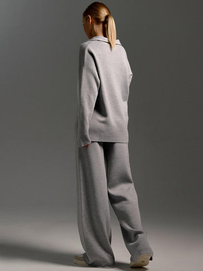 Women's black oversized polo shirt and wide-leg pants set