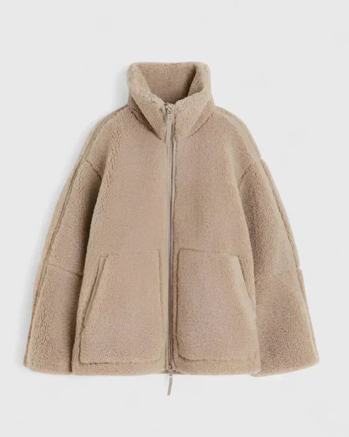 Women's tan sherpa fleece jacket with high collar